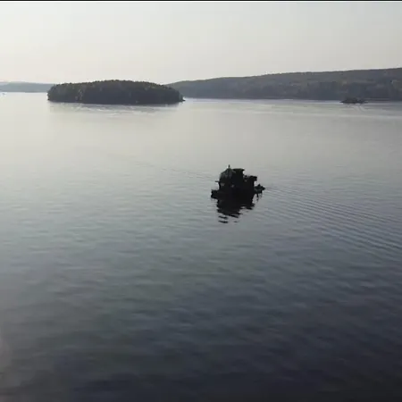 Worlds Only Luxury Glass Igloo Sauna Houseboat Jyväskylä