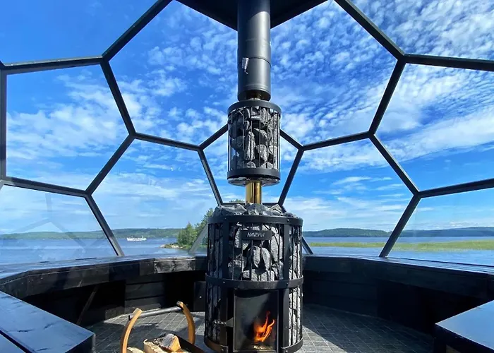 Worlds Only Luxury Glass Igloo Sauna Houseboat Jyväskylä
